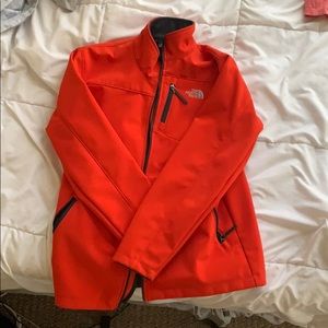Orange heavy north face snowboarding/skiing jacket